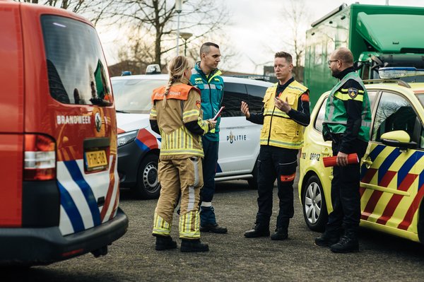 Foto van COPI en kofferbakoverleg